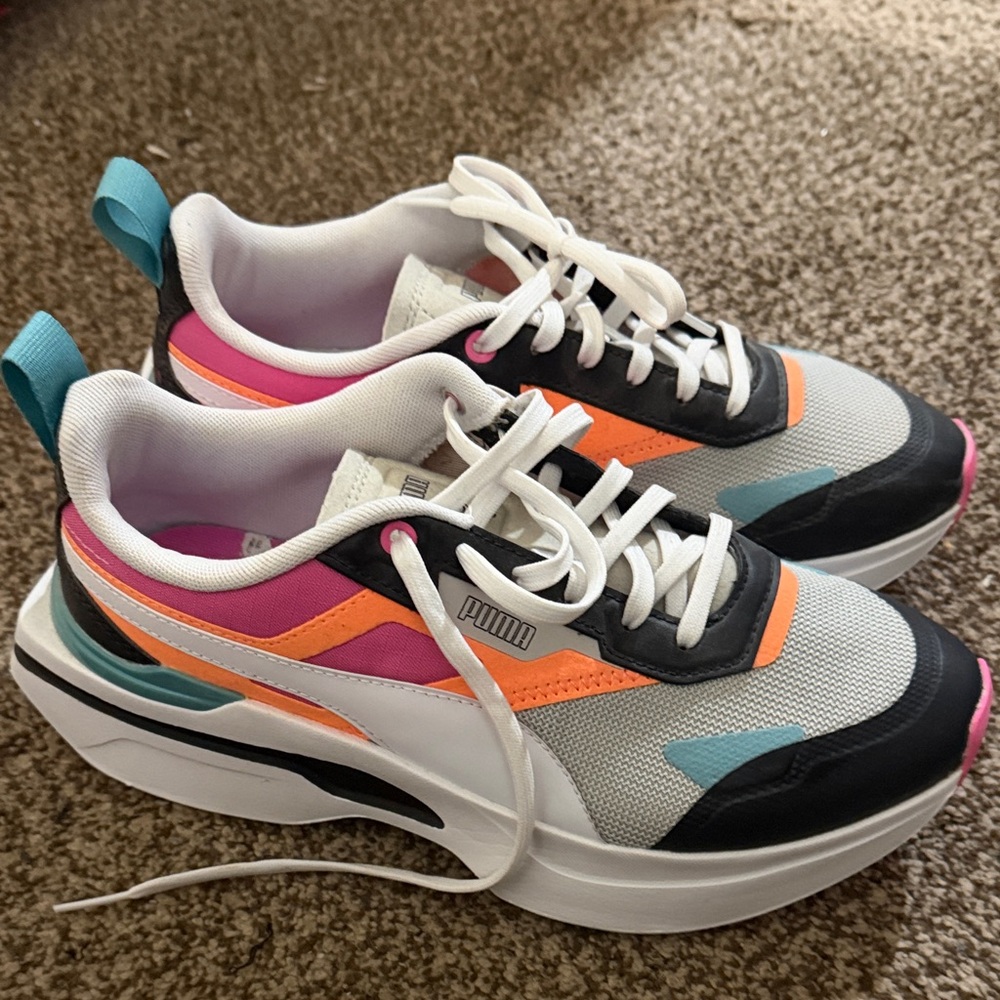 Puma White and Black Sneakers with Vibrant Accents